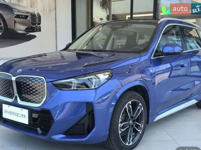 Синий БМВ iX1, объемом двигателя 0 л и пробегом 7 тыс. км за 26000 $, фото 2 на Automoto.ua
