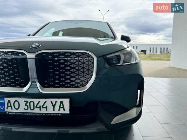 Зеленый БМВ iX1, объемом двигателя 0 л и пробегом 19 тыс. км за 37675 $, фото 1 на Automoto.ua