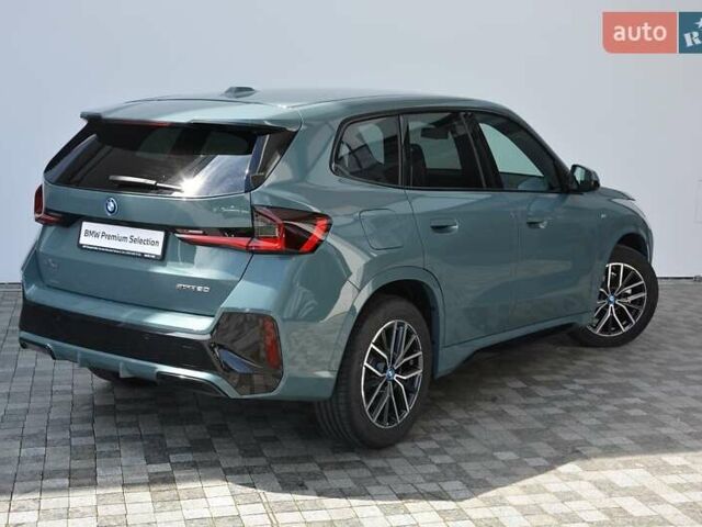 Зеленый БМВ iX1, объемом двигателя 0 л и пробегом 9 тыс. км за 41589 $, фото 2 на Automoto.ua