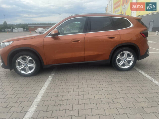 БМВ iX1 2024 в Киеве на Automoto.ua Оранжевый БМВ iX1, объемом двигателя 0 л и пробегом 45 тыс. км за 35000 $, фото 4 на Automoto.ua