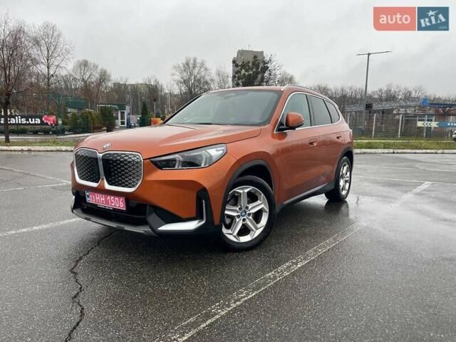 Помаранчевий БМВ iX1, об'ємом двигуна 0 л та пробігом 48 тис. км за 36200 $, фото 1 на Automoto.ua