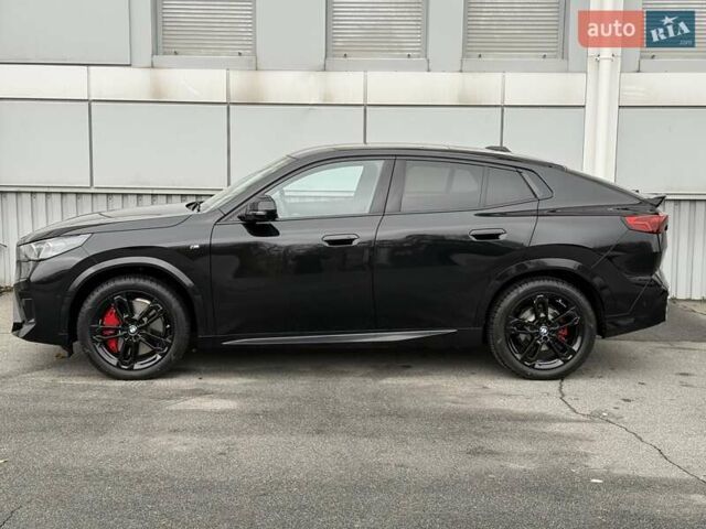 Черный БМВ iX2, объемом двигателя 0 л и пробегом 2 тыс. км за 53666 $, фото 2 на Automoto.ua