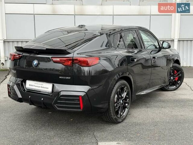 Черный БМВ iX2, объемом двигателя 0 л и пробегом 2 тыс. км за 53666 $, фото 3 на Automoto.ua