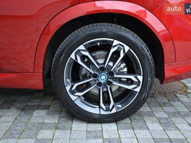 Красный БМВ iX2, объемом двигателя 0 л и пробегом 9 тыс. км за 53143 $, фото 9 на Automoto.ua