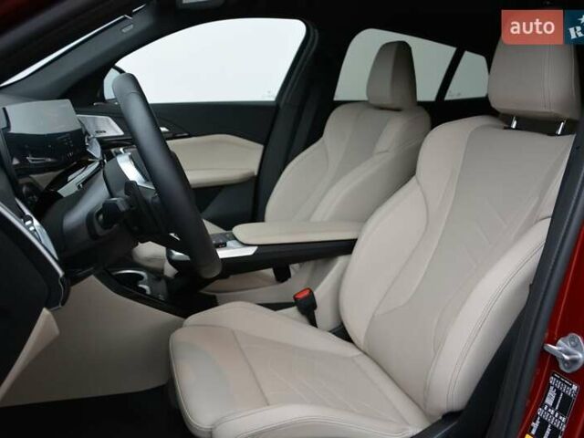 Красный БМВ iX2, объемом двигателя 0 л и пробегом 9 тыс. км за 53143 $, фото 3 на Automoto.ua