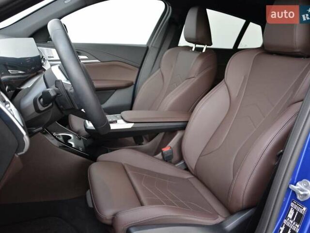 Синий БМВ iX2, объемом двигателя 0 л и пробегом 3 тыс. км за 52261 $, фото 4 на Automoto.ua