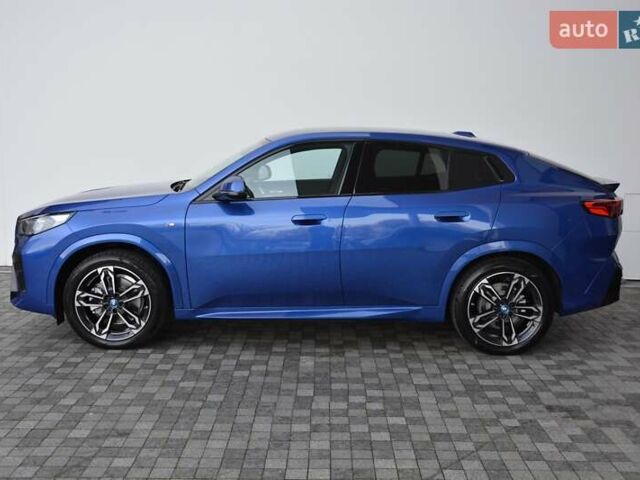 Синий БМВ iX2, объемом двигателя 0 л и пробегом 3 тыс. км за 52261 $, фото 1 на Automoto.ua