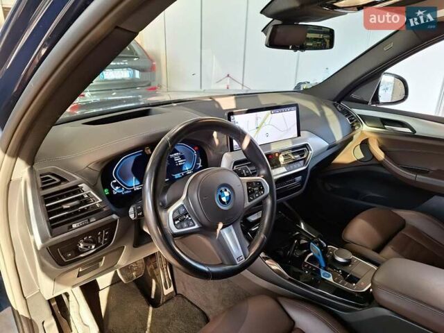 Синий БМВ iX3, объемом двигателя 0 л и пробегом 154 тыс. км за 35000 $, фото 4 на Automoto.ua