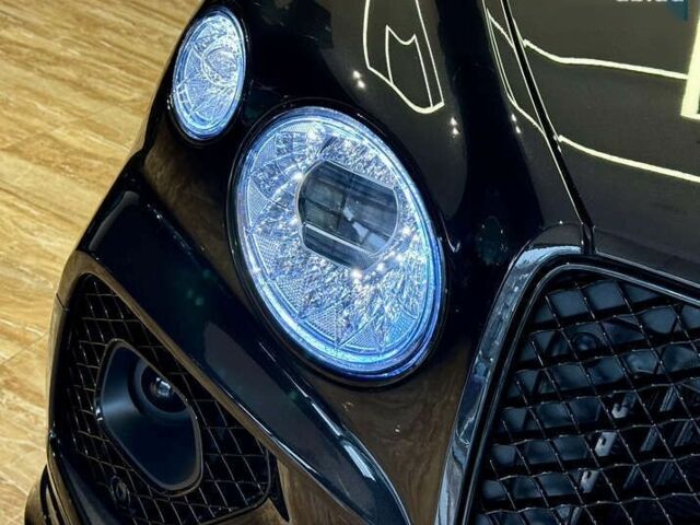 Бентли Бентайга, объемом двигателя 4 л и пробегом 6 тыс. км за 250000 $, фото 3 на Automoto.ua