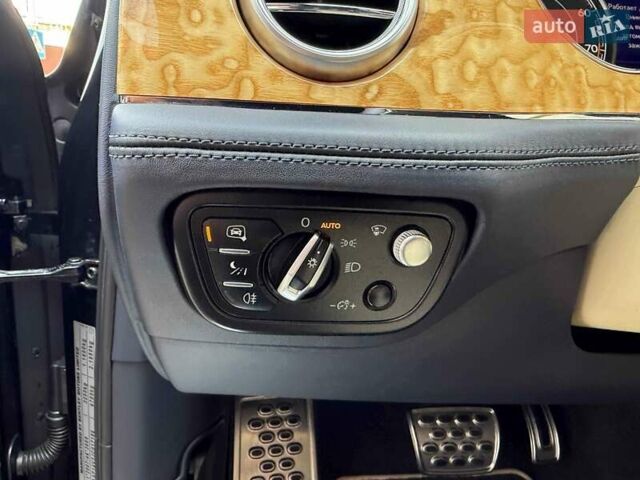 Синий Бентли Бентайга, объемом двигателя 6 л и пробегом 66 тыс. км за 129900 $, фото 21 на Automoto.ua