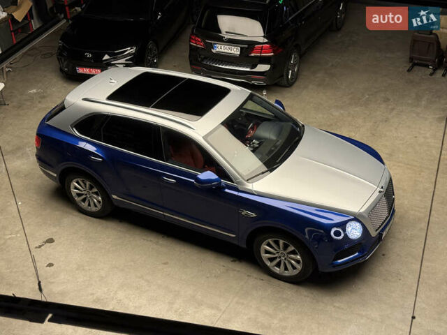 Синий Бентли Бентайга, объемом двигателя 3.96 л и пробегом 110 тыс. км за 140000 $, фото 18 на Automoto.ua