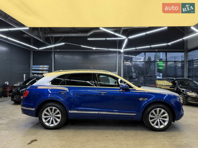 Синий Бентли Бентайга, объемом двигателя 3.96 л и пробегом 110 тыс. км за 140000 $, фото 3 на Automoto.ua