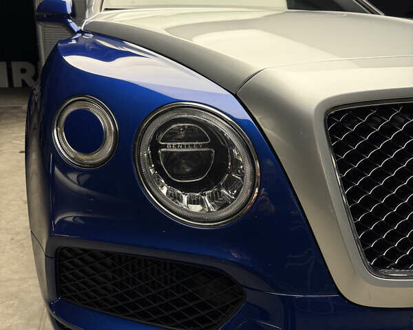 Синий Бентли Бентайга, объемом двигателя 3.96 л и пробегом 110 тыс. км за 140000 $, фото 19 на Automoto.ua