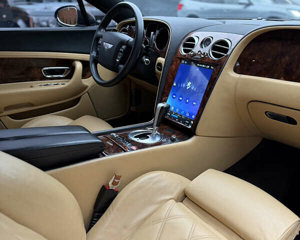 Черный Бентли Континенталь ГТ, объемом двигателя 6 л и пробегом 81 тыс. км за 24000 $, фото 19 на Automoto.ua