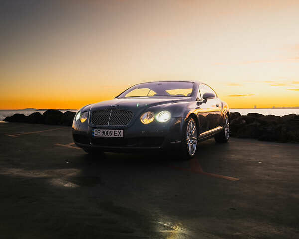 Сірий Бентлі Continental GT, об'ємом двигуна 6 л та пробігом 77 тис. км за 28000 $, фото 2 на Automoto.ua