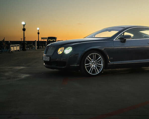 Сірий Бентлі Continental GT, об'ємом двигуна 6 л та пробігом 77 тис. км за 28000 $, фото 6 на Automoto.ua