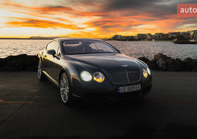 Сірий Бентлі Continental GT, об'ємом двигуна 6 л та пробігом 77 тис. км за 28000 $, фото 1 на Automoto.ua