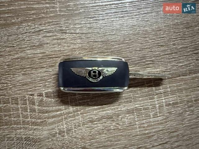 Зелений Бентлі Continental, об'ємом двигуна 6 л та пробігом 87 тис. км за 37500 $, фото 38 на Automoto.ua