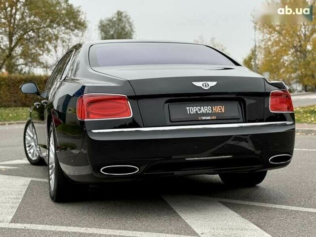 Бентли Флаинг Спур, объемом двигателя 6 л и пробегом 62 тыс. км за 61800 $, фото 13 на Automoto.ua