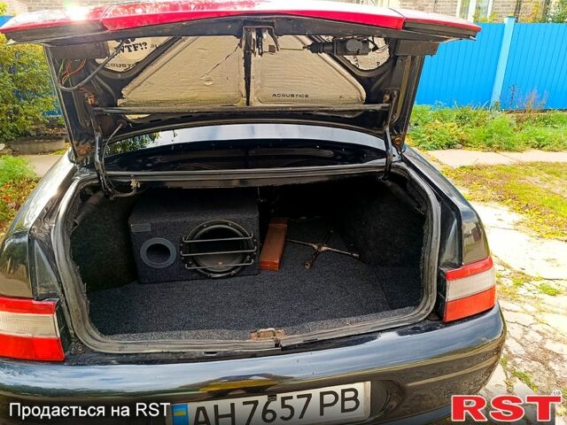 Черный Богдан 2110, объемом двигателя 1.6 л и пробегом 160 тыс. км за 2800 $, фото 9 на Automoto.ua
