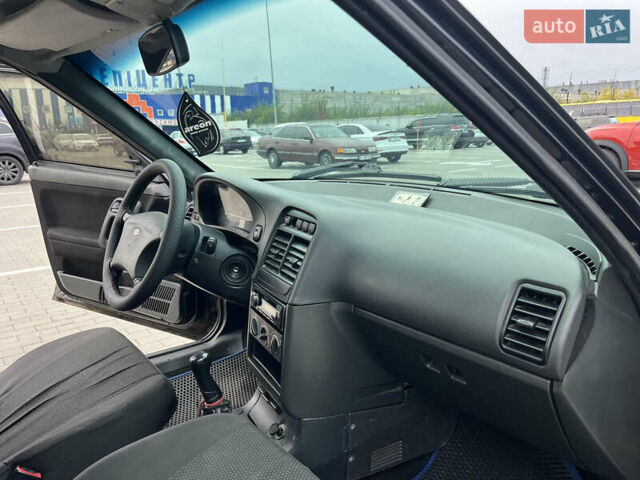 Черный Богдан 2110, объемом двигателя 1.6 л и пробегом 255 тыс. км за 3200 $, фото 10 на Automoto.ua