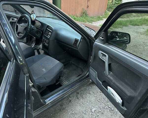 Черный Богдан 2110, объемом двигателя 1.6 л и пробегом 219 тыс. км за 1800 $, фото 12 на Automoto.ua