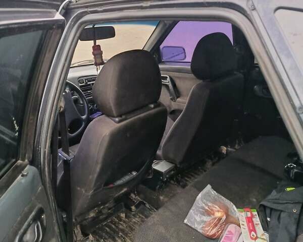 Черный Богдан 2110, объемом двигателя 1.6 л и пробегом 250 тыс. км за 1400 $, фото 1 на Automoto.ua