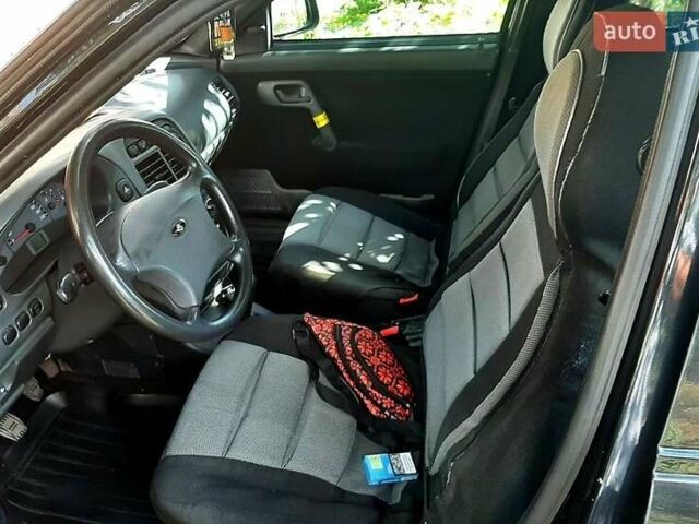 Черный Богдан 2110, объемом двигателя 1.6 л и пробегом 100 тыс. км за 3300 $, фото 3 на Automoto.ua