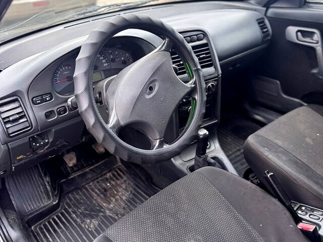 Черный Богдан 2110, объемом двигателя 1.6 л и пробегом 115 тыс. км за 2300 $, фото 4 на Automoto.ua