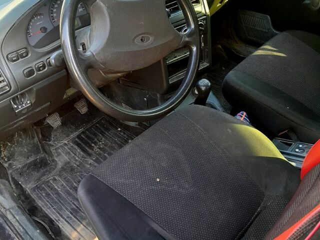 Черный Богдан 2111, объемом двигателя 1.5 л и пробегом 211 тыс. км за 1500 $, фото 1 на Automoto.ua