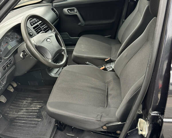 Черный Богдан 2111, объемом двигателя 1.6 л и пробегом 45 тыс. км за 3100 $, фото 9 на Automoto.ua