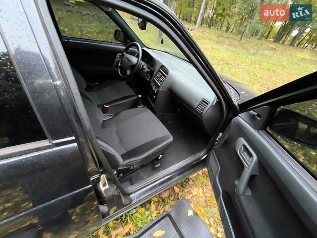 Черный Богдан 2111, объемом двигателя 1.6 л и пробегом 25 тыс. км за 3900 $, фото 20 на Automoto.ua