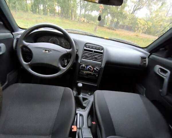 Черный Богдан 2111, объемом двигателя 1.6 л и пробегом 25 тыс. км за 3900 $, фото 18 на Automoto.ua