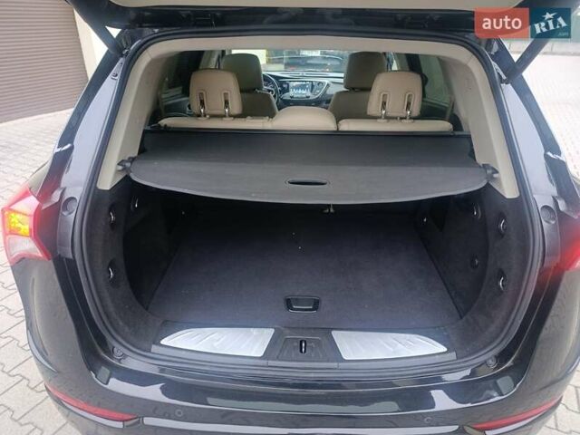 Черный Бьюик Envision, объемом двигателя 2.5 л и пробегом 185 тыс. км за 12800 $, фото 6 на Automoto.ua