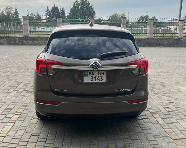 Коричневый Бьюик Envision, объемом двигателя 2.46 л и пробегом 315 тыс. км за 12500 $, фото 4 на Automoto.ua