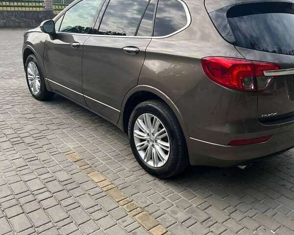 Коричневый Бьюик Envision, объемом двигателя 2.46 л и пробегом 315 тыс. км за 12500 $, фото 3 на Automoto.ua