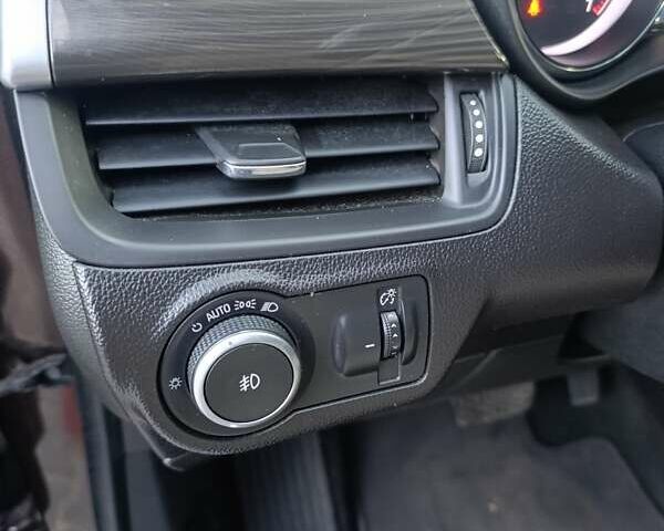 Коричневый Бьюик Envision, объемом двигателя 2.5 л и пробегом 139 тыс. км за 16800 $, фото 4 на Automoto.ua