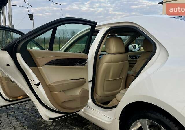 Белый Кадиллак АТС, объемом двигателя 2 л и пробегом 216 тыс. км за 8800 $, фото 64 на Automoto.ua