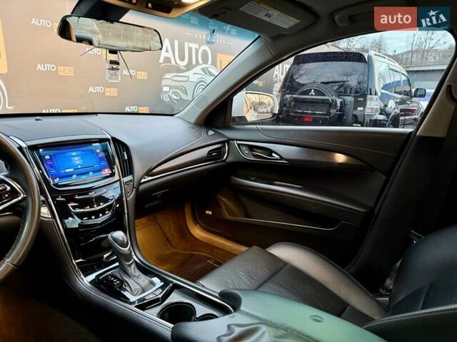 Белый Кадиллак АТС, объемом двигателя 2 л и пробегом 151 тыс. км за 11000 $, фото 13 на Automoto.ua