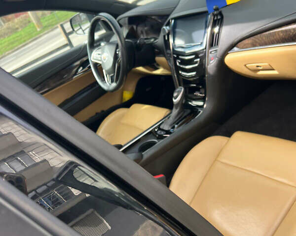 Черный Кадиллак АТС, объемом двигателя 2 л и пробегом 150 тыс. км за 7000 $, фото 5 на Automoto.ua