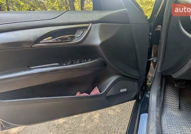 Чорний Каділак АТС, об'ємом двигуна 2.46 л та пробігом 135 тис. км за 12200 $, фото 5 на Automoto.ua