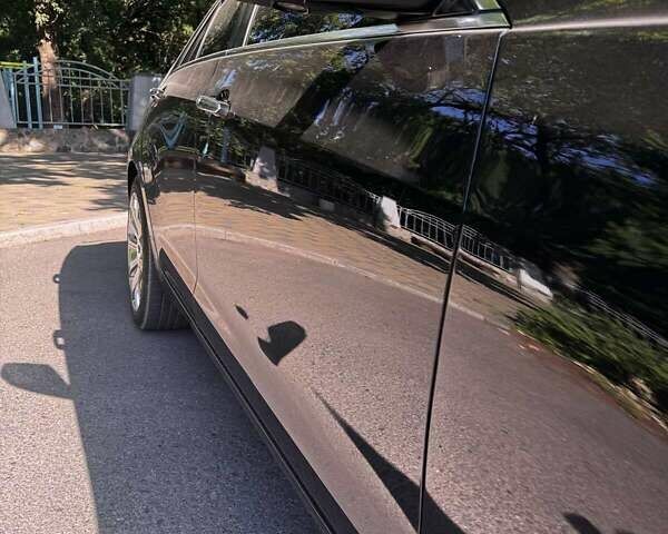 Чорний Каділак АТС, об'ємом двигуна 2 л та пробігом 72 тис. км за 12500 $, фото 6 на Automoto.ua