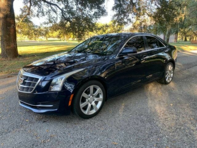 Чорний Каділак АТС, об'ємом двигуна 2 л та пробігом 72 тис. км за 9200 $, фото 2 на Automoto.ua