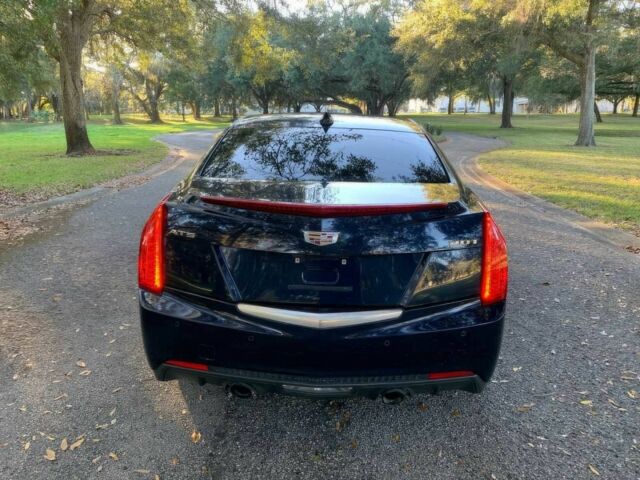 Чорний Каділак АТС, об'ємом двигуна 2 л та пробігом 72 тис. км за 9200 $, фото 6 на Automoto.ua
