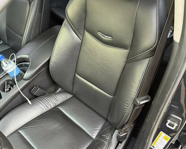 Серый Кадиллак АТС, объемом двигателя 2 л и пробегом 149 тыс. км за 12700 $, фото 22 на Automoto.ua