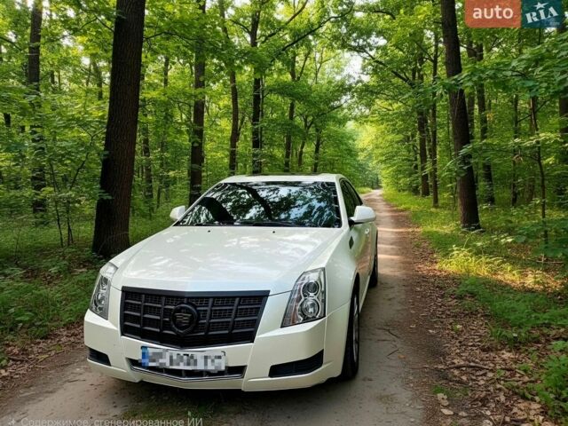 Білий Каділак CTS, об'ємом двигуна 3 л та пробігом 185 тис. км за 7700 $, фото 1 на Automoto.ua
