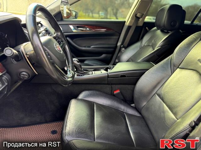 Белый Кадиллак СТС, объемом двигателя 2 л и пробегом 240 тыс. км за 13500 $, фото 4 на Automoto.ua