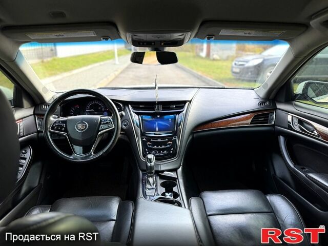 Белый Кадиллак СТС, объемом двигателя 2 л и пробегом 240 тыс. км за 13500 $, фото 7 на Automoto.ua