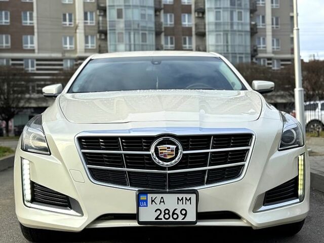Белый Кадиллак СТС, объемом двигателя 2 л и пробегом 240 тыс. км за 13500 $, фото 1 на Automoto.ua