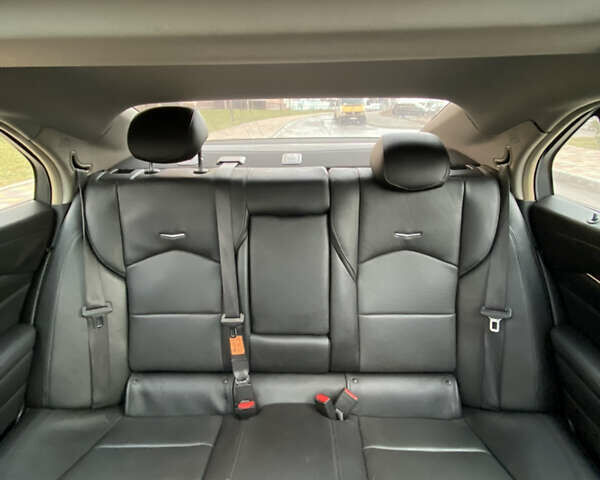 Белый Кадиллак СТС, объемом двигателя 2 л и пробегом 170 тыс. км за 13000 $, фото 11 на Automoto.ua